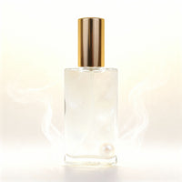 Seelen Spray Vergebung in einer eleganten Glasflasche mit goldfarbener Verschlusskappe und zart goldgelber Füllung – energetisches Aura-Spray zur Unterstützung von Loslassen, innerem Frieden und heilsamer Vergebung auf seelischer Ebene.